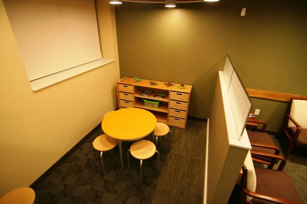 Waiting room with table and chairs- children area 