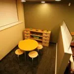 Waiting room with table and chairs- children area 