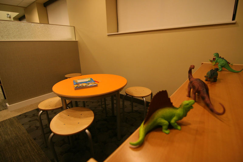 Child waiting area with toys and table